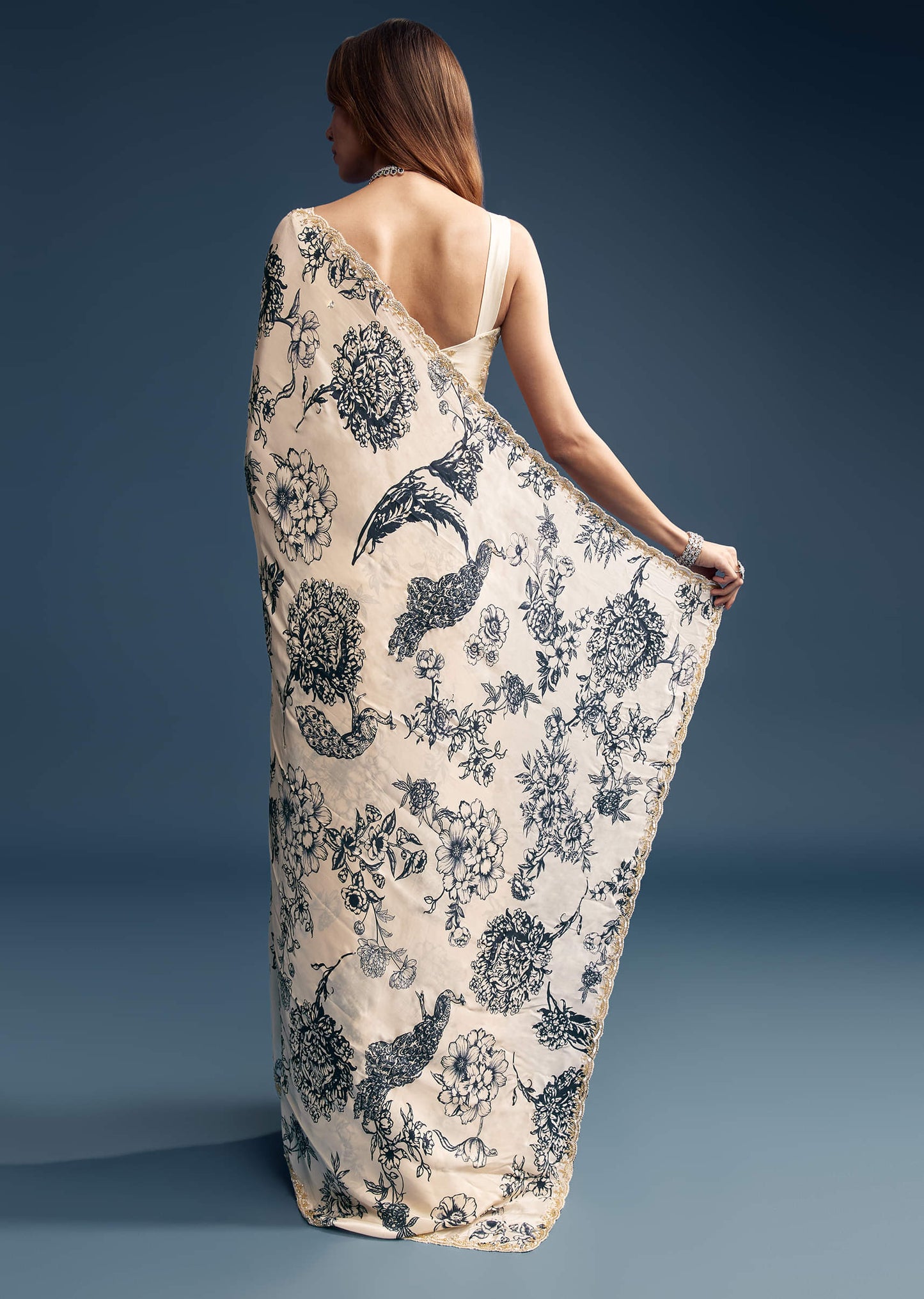 Cream Crepe Saree With Black Floral Print And Embroidery